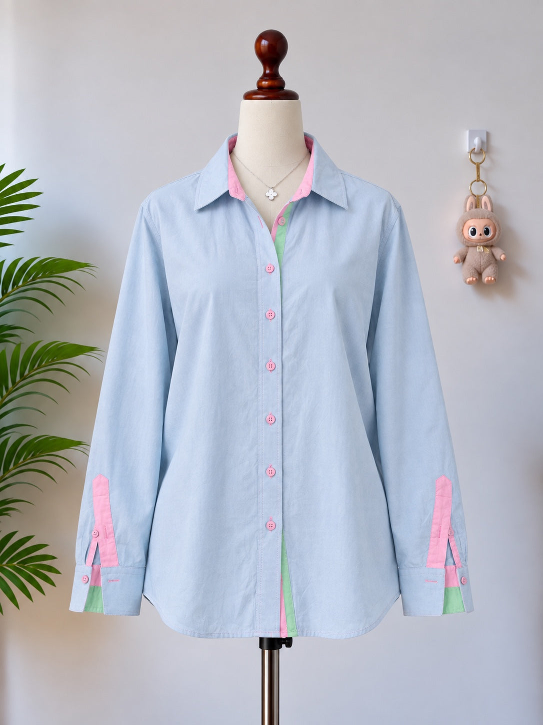 Light blue contrast trim button-up shirt front