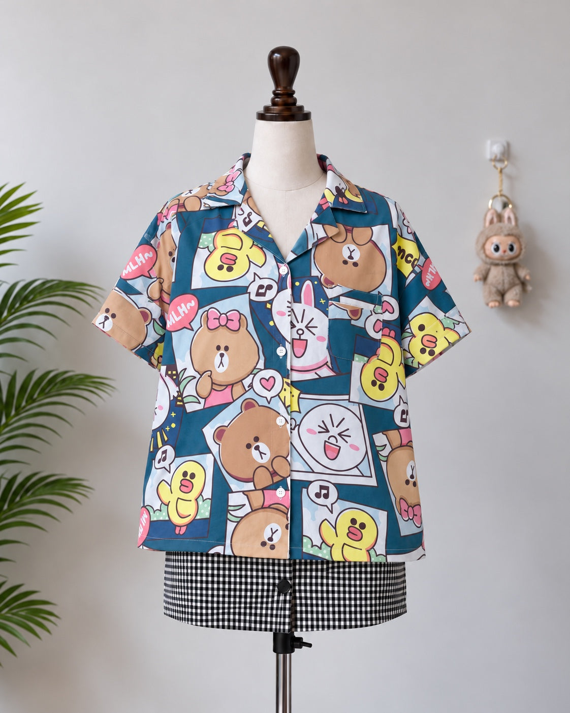 Cartoon print short sleeve shirt on mannequin