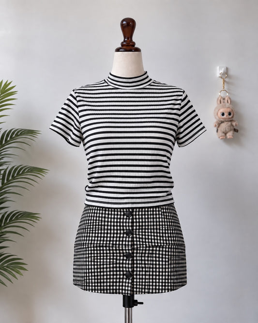 Black and white striped mock neck top