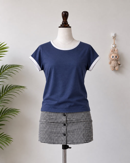 Navy blue ringer T-shirt with white trim on mannequin